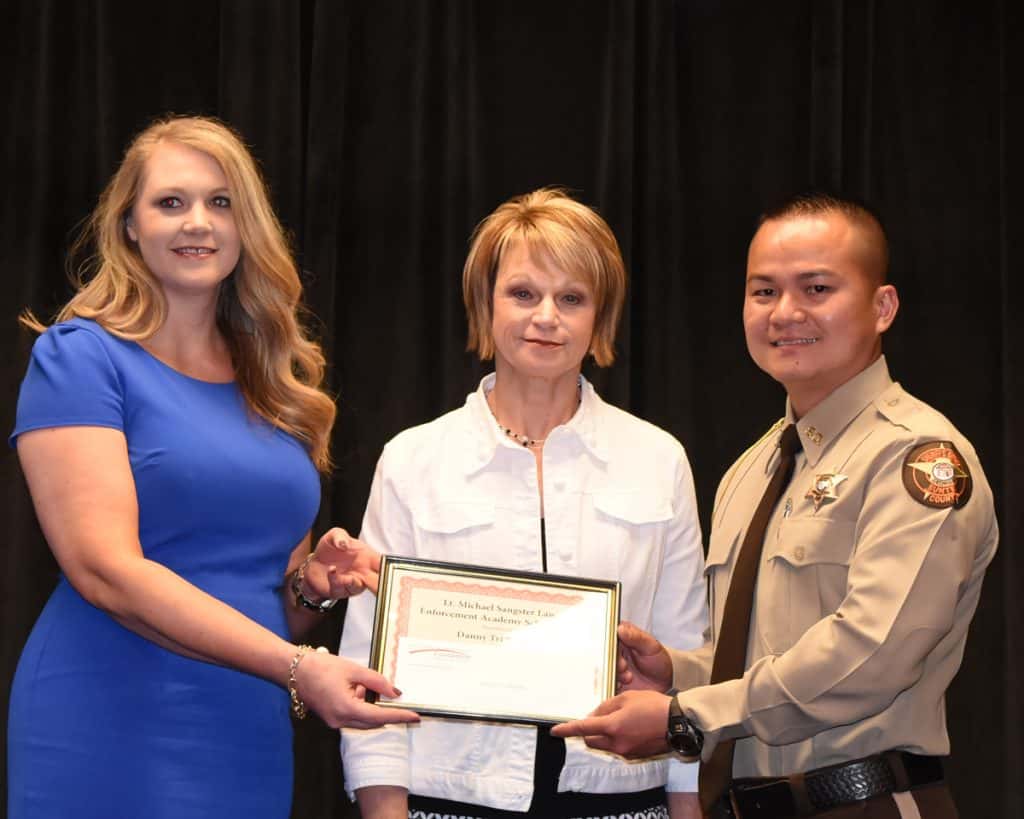 Student receiving the Lt. Michael Sangster Law Enforcement Academy Scholarship