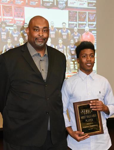 Travis Garrett, head coach of the Jets is shown above with Rico Simmons, MVP for 2015 – 2016 Jets.