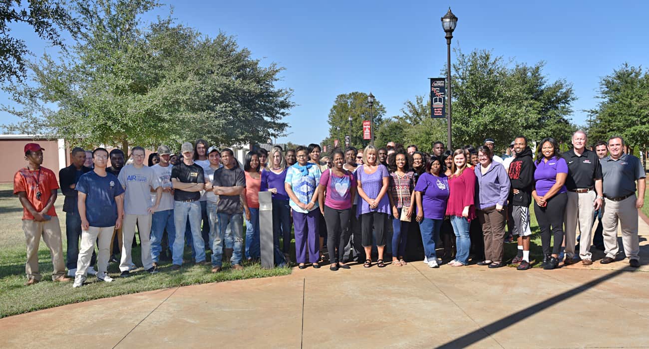 SGTC students and advisors gathered to raise awareness for domestic violence by participating in a Domestic Violence Awareness Month walk recently on SGTC’s Americus campus.