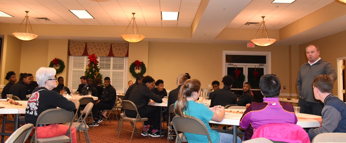 Steven Wright, Associate Pastor at Central Baptist Church and former SGTC Jets basketball coach, is shown above talking with the Jets and Lady Jets about the importance of giving thanks every day.