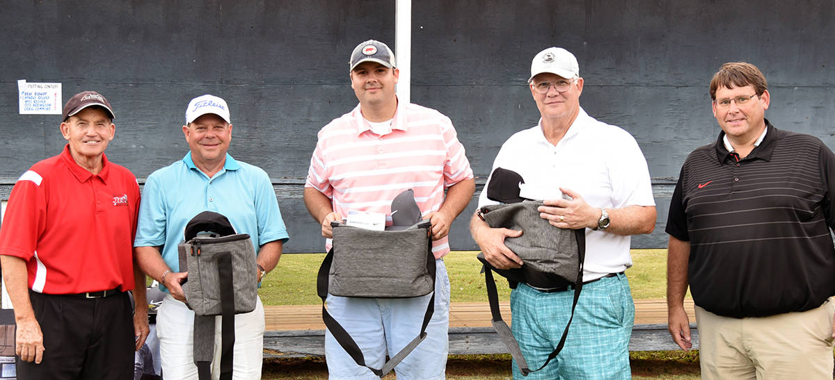 Shown above is the SB&T team which finished third. SGTC President Emeritus Sparky Reeves is shown with Buddy Guth, Jason Evans, Sam Hunter, Jr., and SGTC Athletic Director James Frey.