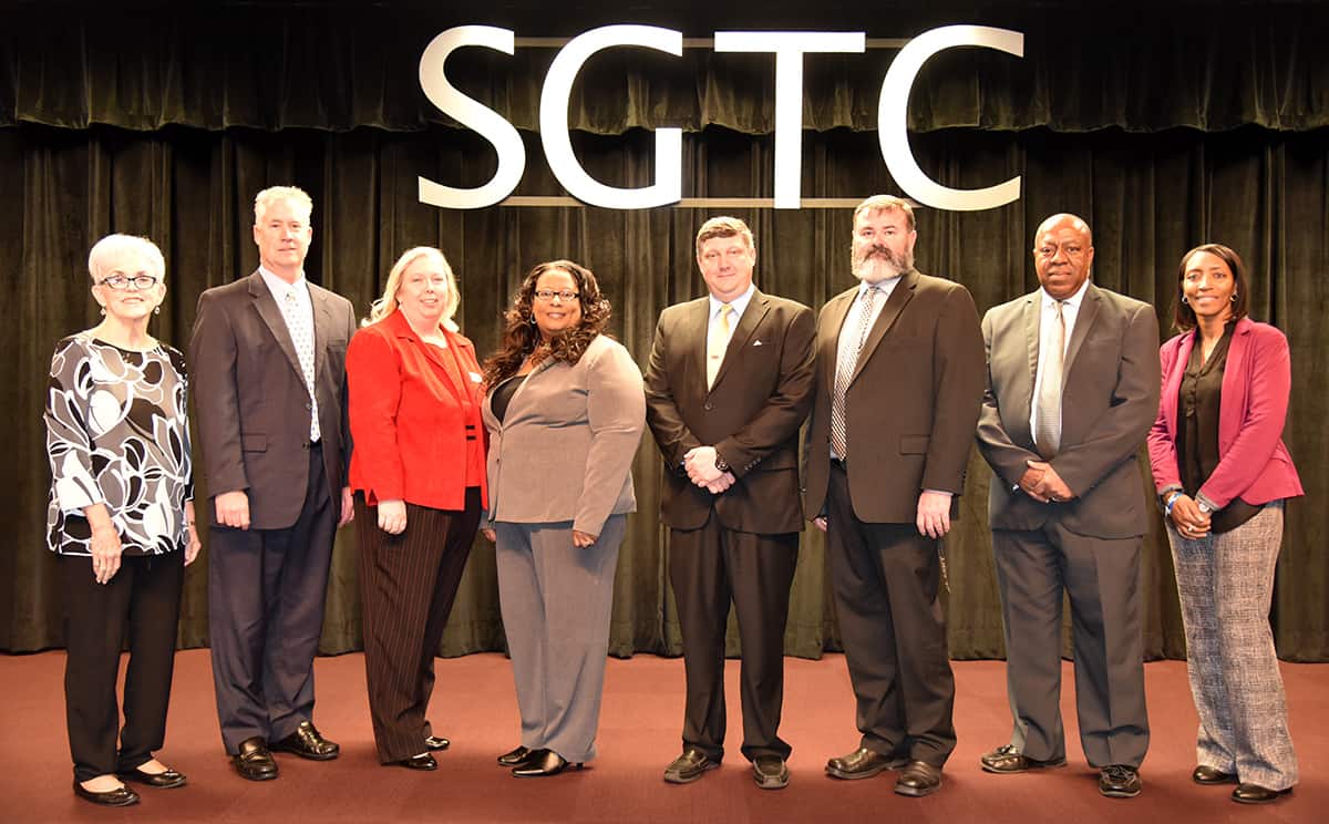 South Georgia Technical College’s Instructor of the Year nominees stand with the panel of judges during a recent luncheon to honor the nominees. Left to right: Martha Arrington, Dr. David Mims, Teresa McCook, Dr. Michele Seay, Kevin Beaver, Adam Hathaway, Dr. George Porter, and Dr. Dorothy Ingram.