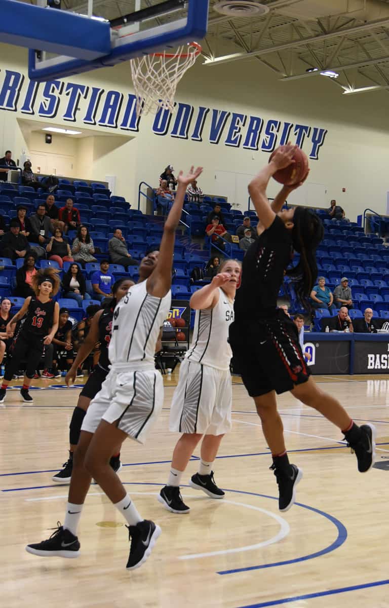 Dakata Toney, 3, drove to the basket to score two points for the Lady Jets.