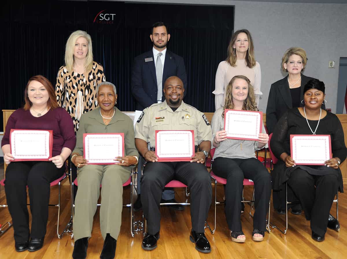  Seated from left to right: Student of Excellence nominees Madison Stubbs, Lessie Harper, Lundy Emerson, Carolyn Luther, and Lachantay Smith. (David Ethridge not pictured). Standing from left to right are nominating instructors Teresa Jolly, Eli Gonzalez, Lisa Penton, and Karen Bloodworth.