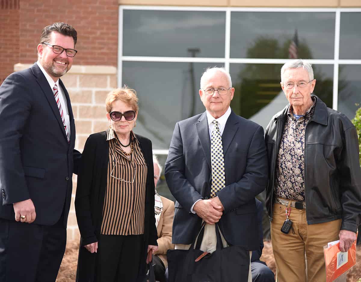 SGTC President Dr. John Watford recognized (l to r) Marcia Morgan Wright and W. D. (David) Morgan, III, with former SGTC Aviation Instructor Frank Gassett who was a student of the Morgan’s father, W. Dave Morgan, for whom the building was named.