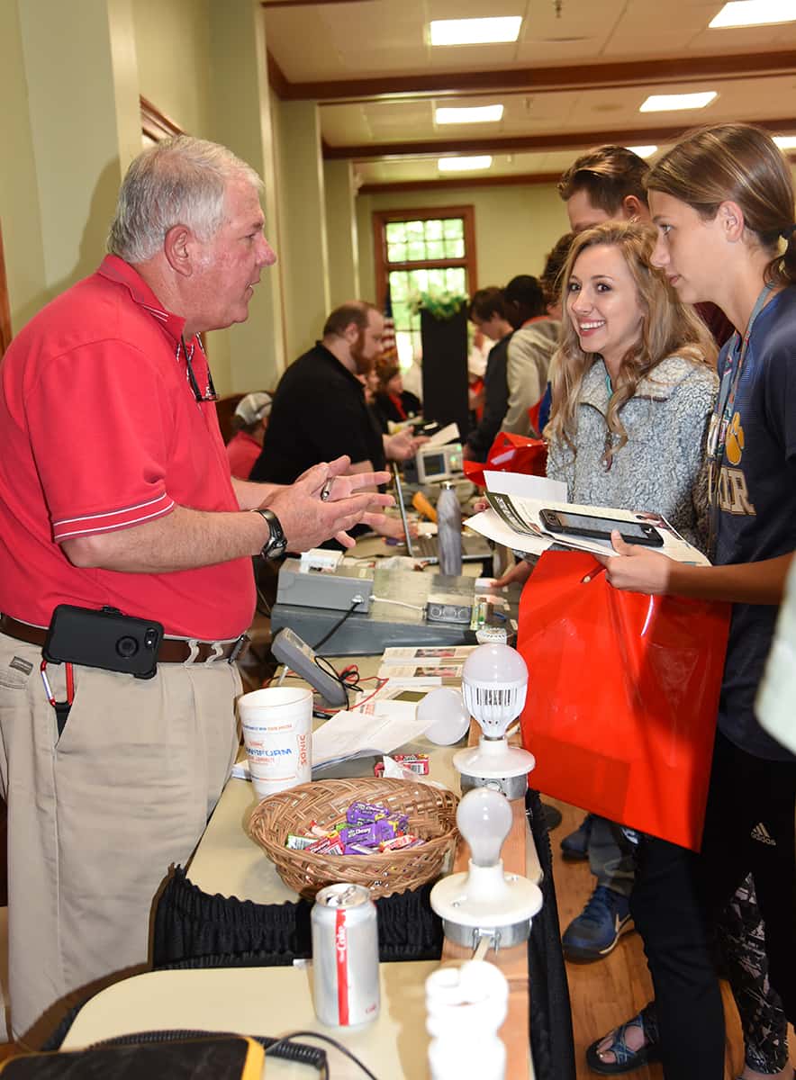 Students are shown above talking with South Georgia Tech’s Mike Enfinger who teaches Industrial Electrical and Air Conditioning Technology on the Crisp County Center campus.