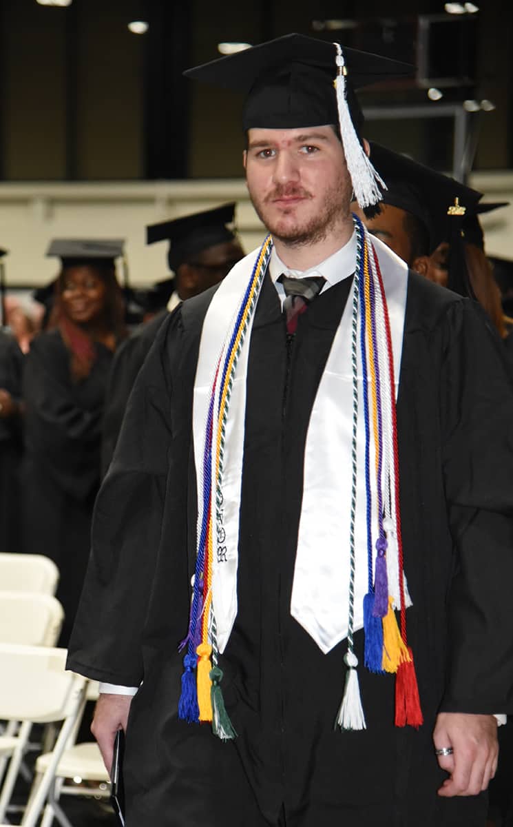 Dakata Hall of Cordele was awarded his Computer Support Specialist and Networking Specialist Diplomas at SGTC’s Spring graduation.  He was an Honor Graduate as well as a member of the National Technical Honor Society, Phi Beta Lambda, Skills USA, and the Student Government Association.  He is shown with his white honor graduate stole as well as the white and purple cords, blue cords, red and white cords, and green and white cords for his different honors and recognitions.