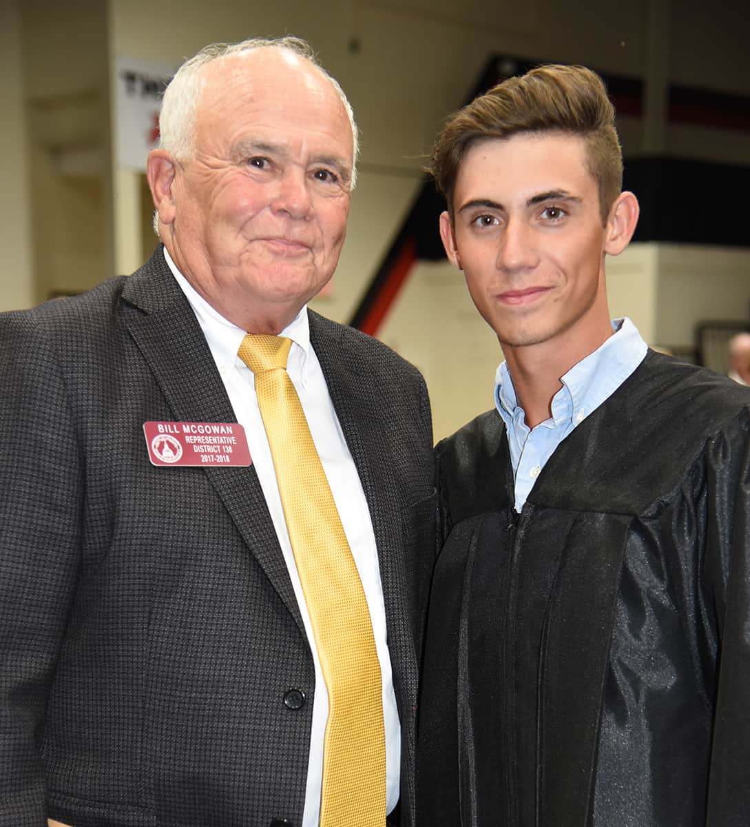 State Representative Bill McGowan is shown above with one of the GED graduates. Representative McGowan was the guest speaker.