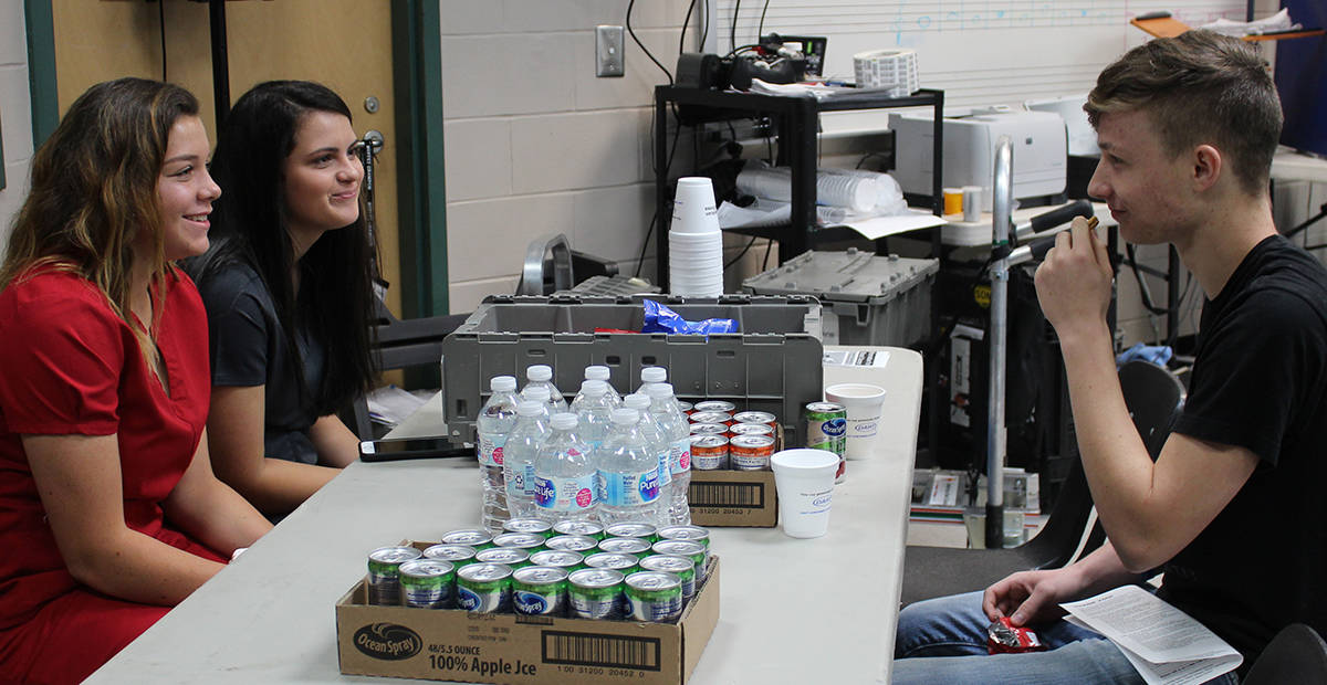 Two of the SGTC Schley County CNA students are shown above manning the refreshment area as part of the American Red Cross Blood Drive at Schley County High School recently.