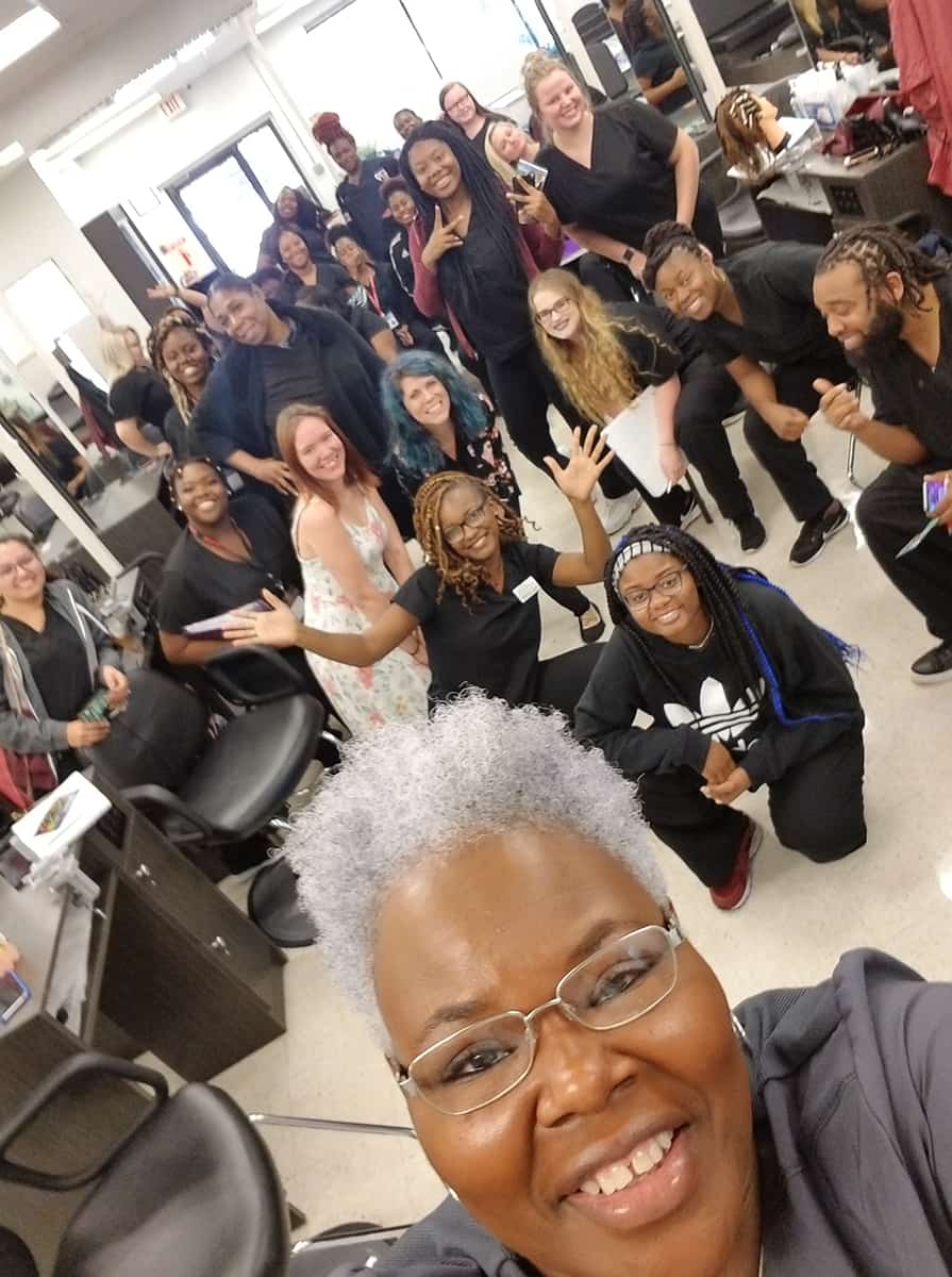 South Georgia Technical College Cosmetology Instructor Dorothea Lusane McKenzie is shown with her students and the Jennifer Bowens of Miss J's Salon after the “Color Made Easy” presentation.