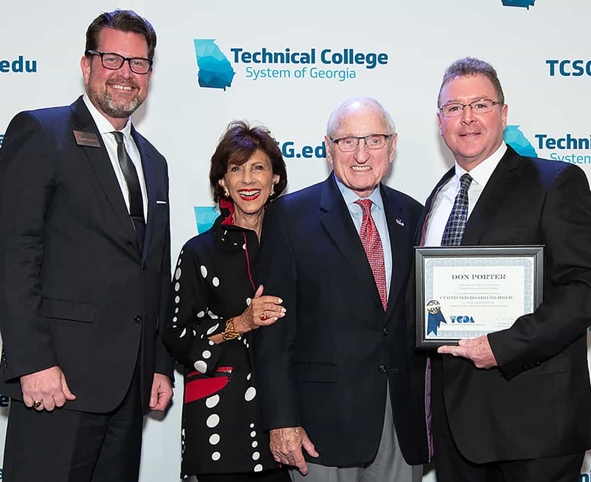 South Georgia Technical College President Dr. John Watford is shown above with former University of Georgia Athletic Director and Head Football coach Vince Dooley and his wife Barbara and SGTC Board member Don Porter who earned his Certified Board Member status with TCDA.  The Dooley’s were the guest speakers at the TCSG Leadership Conference.