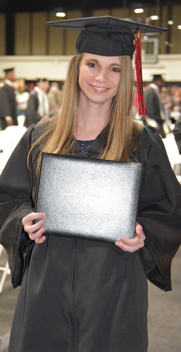 Alyssa Turner from Schley County is shown above after graduating from the licensed practical nursing program and receiving her SGTC diploma.