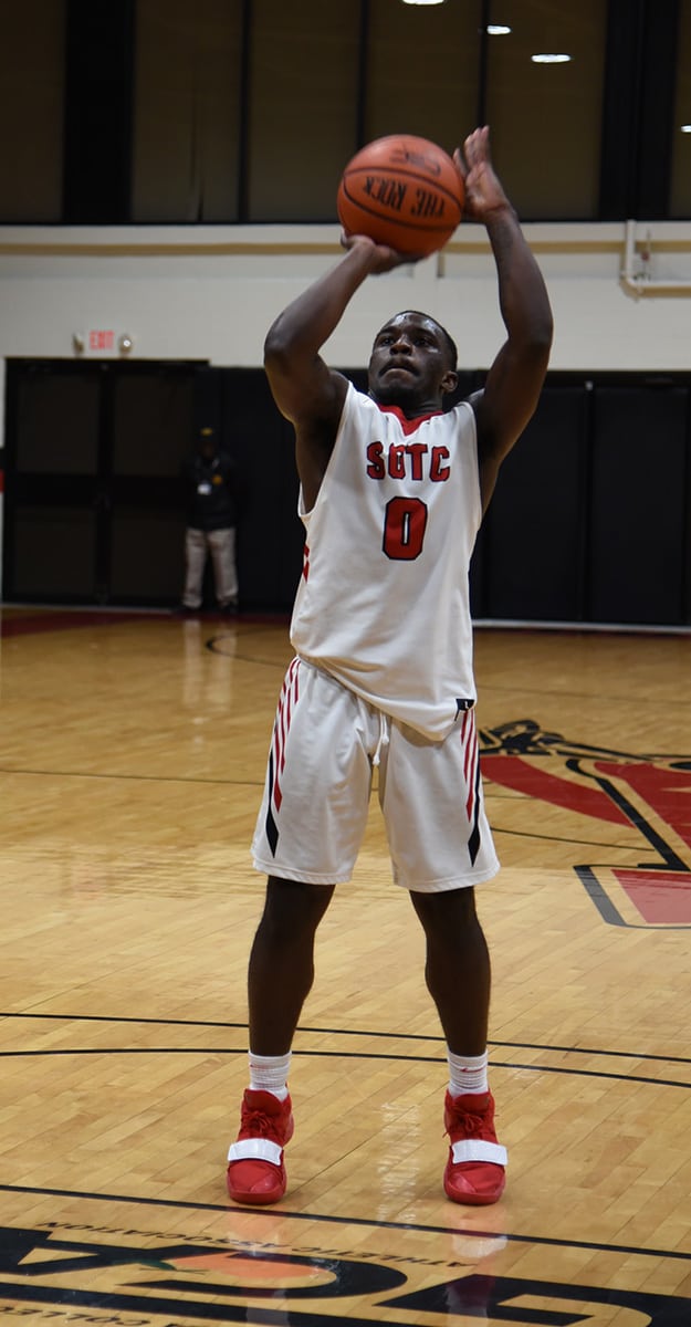 Freshman Dijon Brown, 0, made two free throws in the final seconds of the game to ice the 69 – 65 victory for South Georgia Tech over Marion Military.