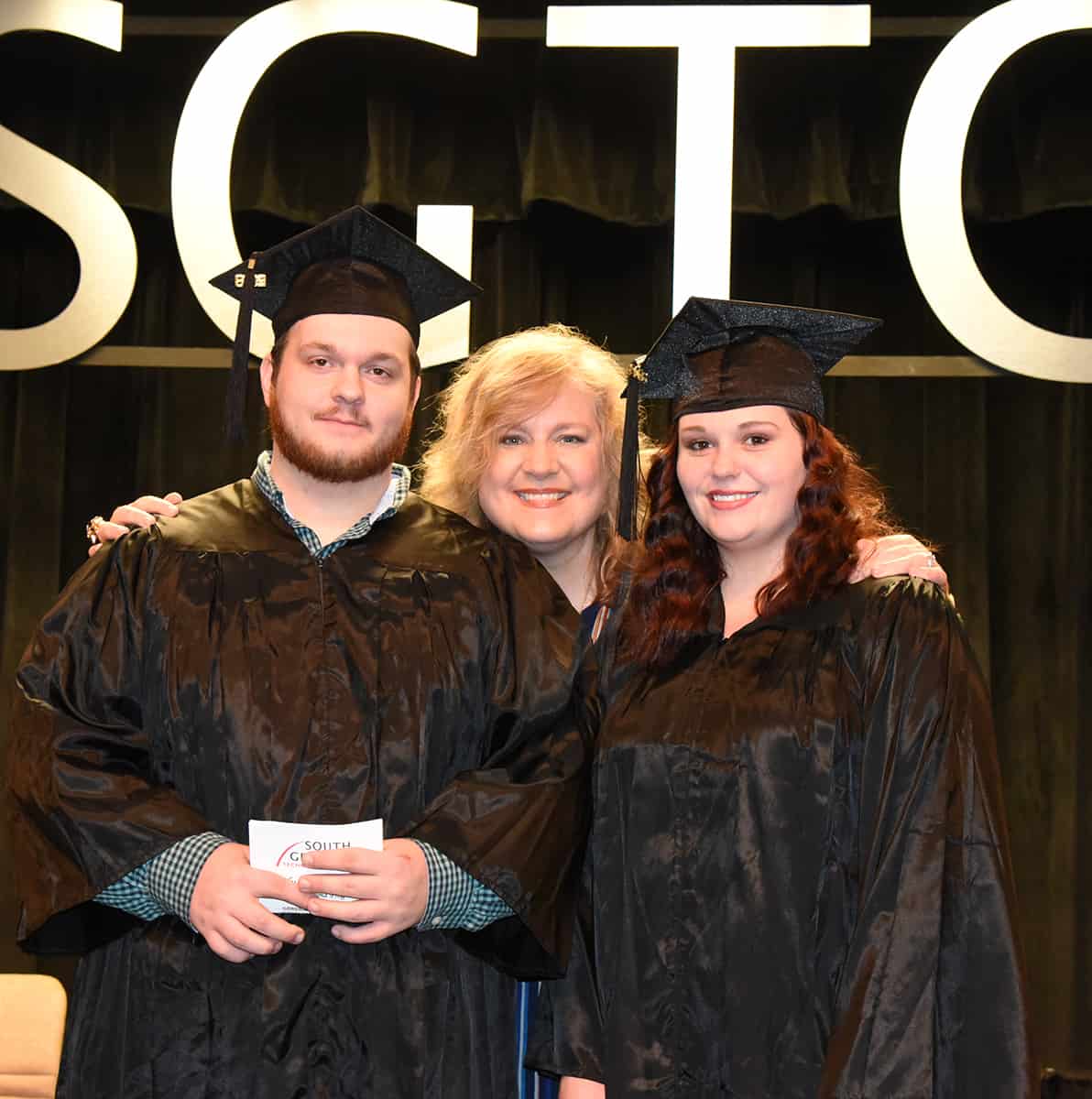 SGTC GED Instructor Alanna Goolsby is shown above with the Taylor County GED graduates.