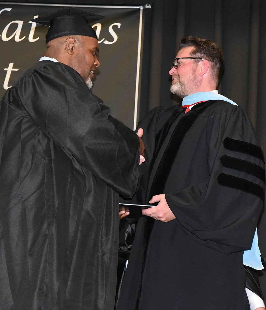 Kelvin Bernard Fowler of Macon County is shown above accepting his diploma in Aircraft Structural Technology from Dr. Watford.  He has accepted a job with Lockheed Martin in Marietta.