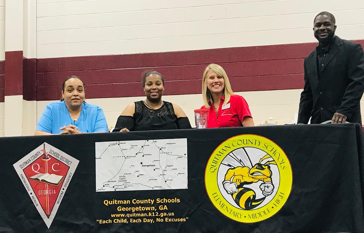  South Georgia Technical College Admission Director Whitney Crisp is shown above at the recruiting table during the Quiman County High School signing day event