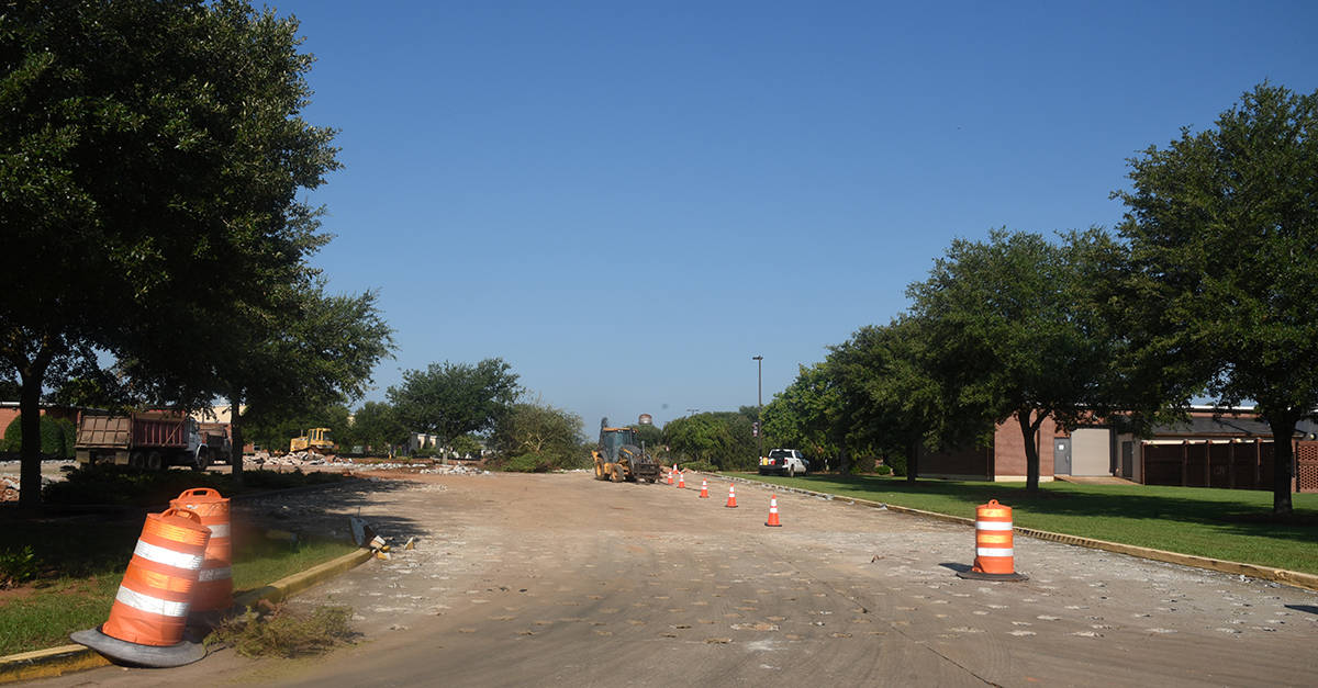 The road in front of the gymnasium all the way to the Energy and Transportation Center building is closed.  The concrete is being broken up and new paving with occur with different parking and walking areas.  A roundabout will be incorporated at each end of this corridor to slow down traffic.