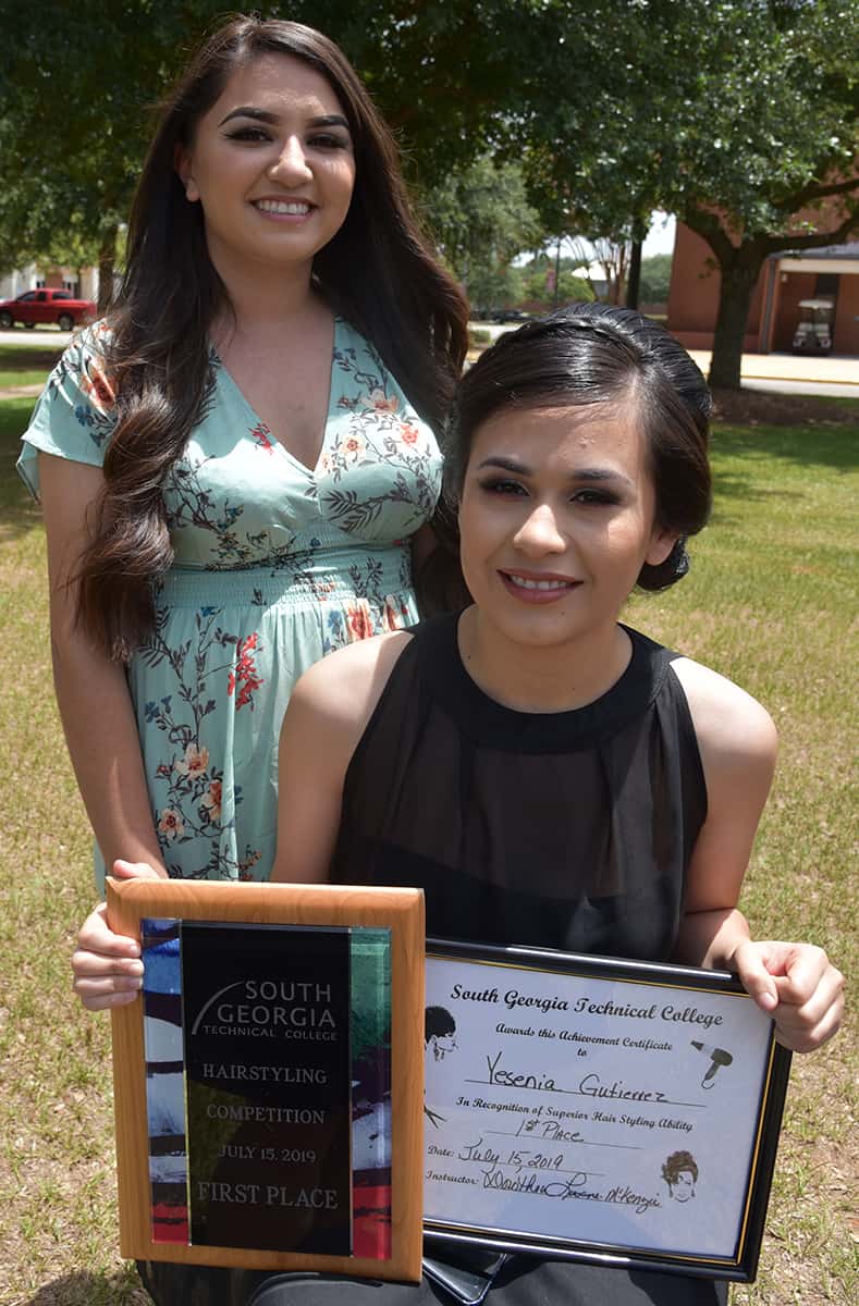 Yeshia Gutierrez of Oglethorpe took first place in the South Georgia Technical College Cosmetology hairstyling competition recently.  She is shown here with her model Paola Gutierez.