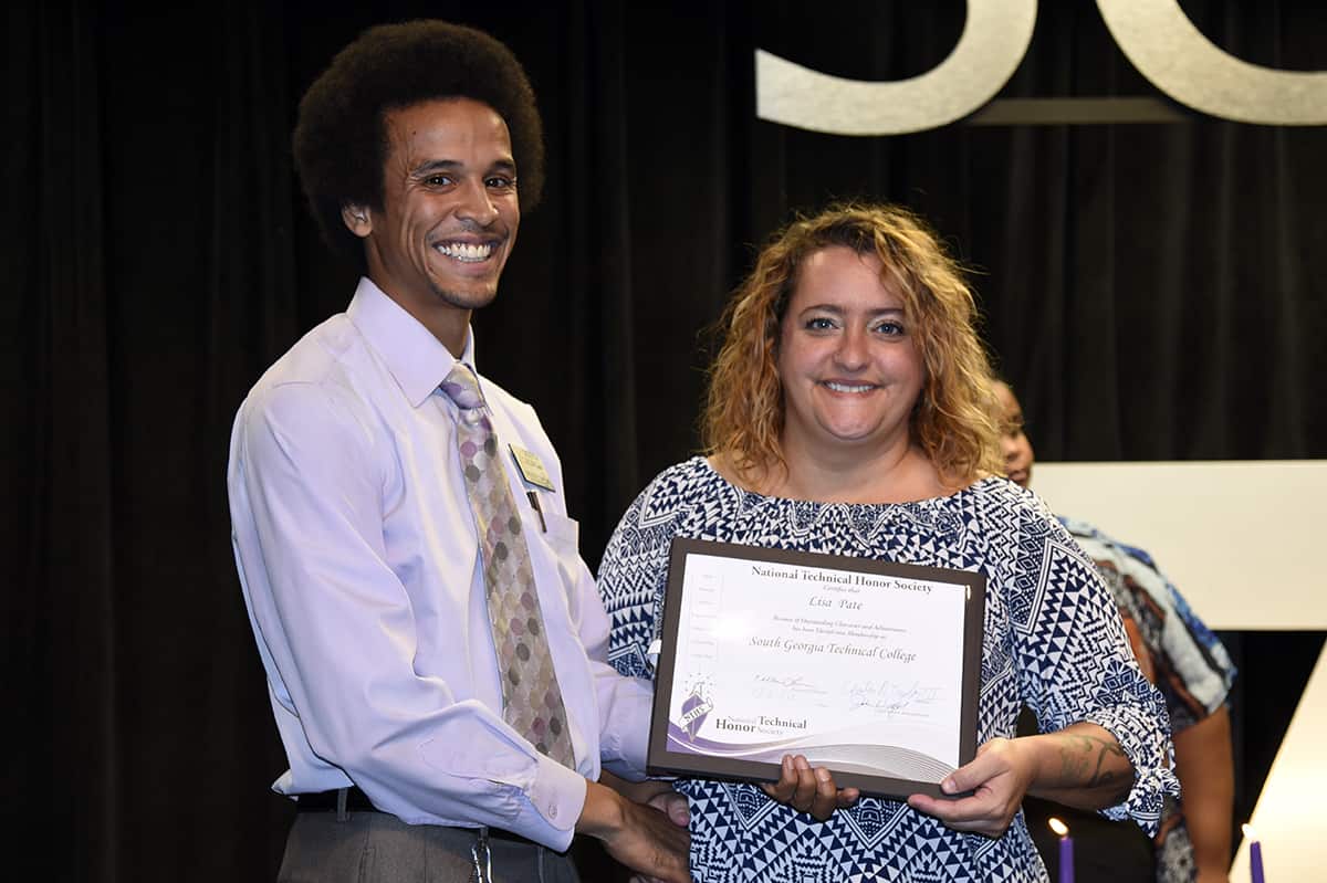  SGTC mathematics instructor Chester Taylor with NTHS inductee Lisa Pate