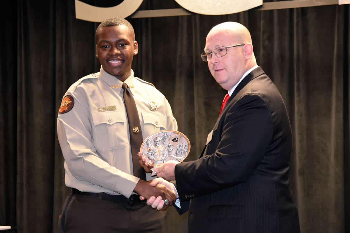 Monteze McCall of Bainbridge was chosen by his fellow cadets as Class Representative. Here he receives the honor from LEA Director Brett Murray.