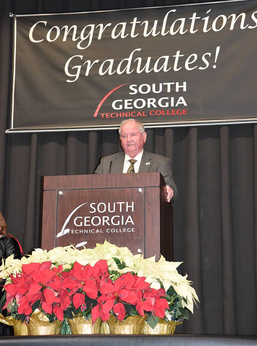 South Georgia Technical College Chairman of the Board of Directors Jimmy Davis is shown above introducing SGTC Law Enforcement Academy Director and the 2019 Teacher of the Year Brett Murray as the special guest speaker at graduation. 