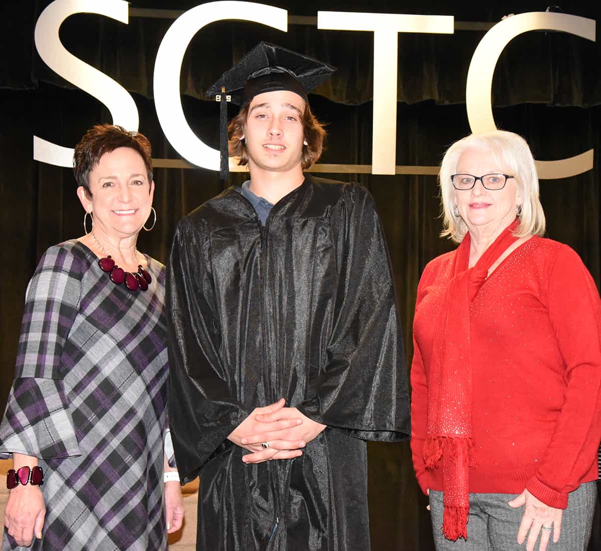 Webster County GED graduate Dreyson Scott is shown above with Dean Lillie Ann Winn and instructor Betty Ann Eshmann.