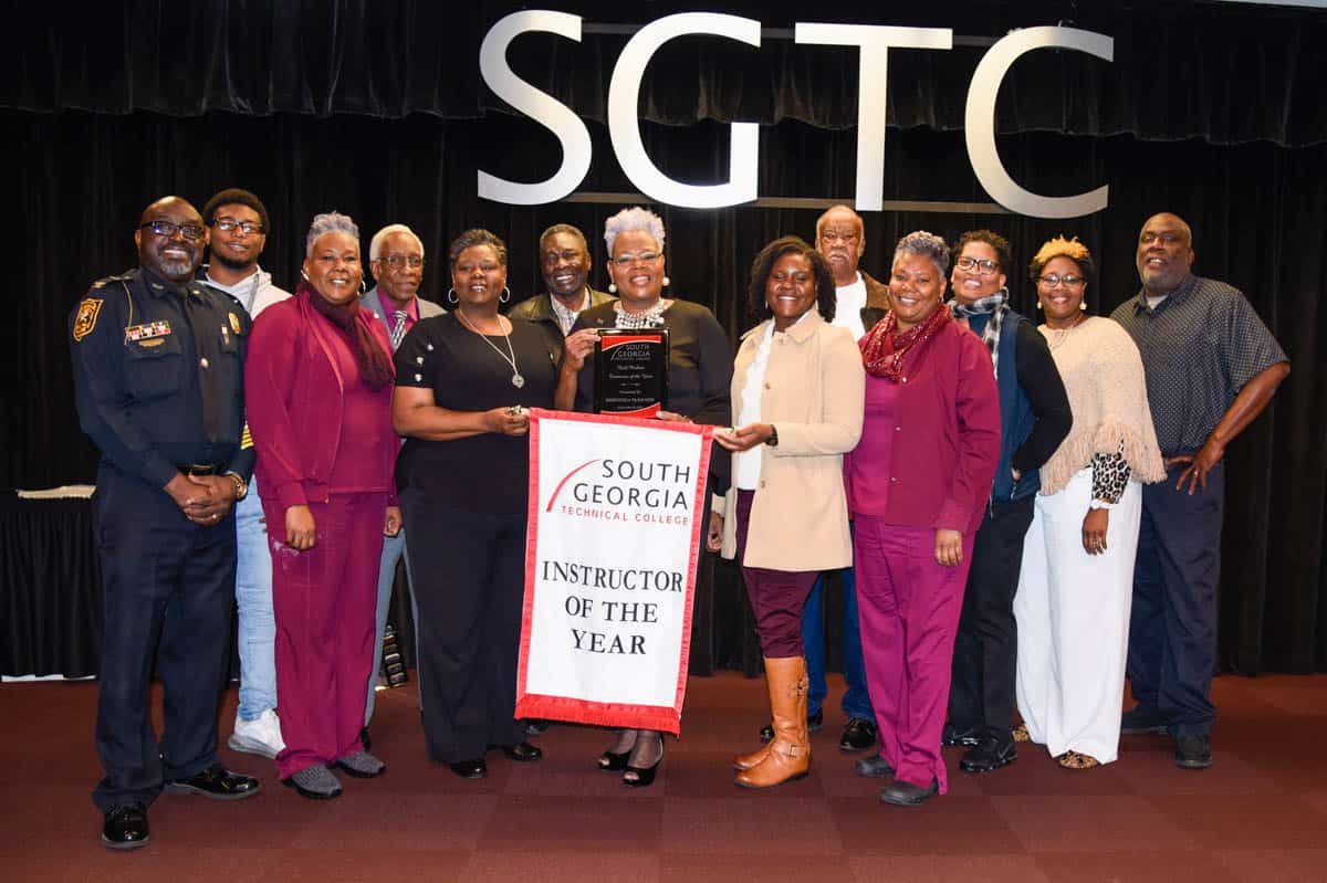 SGTC cosmetology instructor Dorothea Lusane McKenzie (center) is pictured with her family at a recent event to recognize her as the 2020 recipient of the Rick Perkins Instructor of the Year Award.