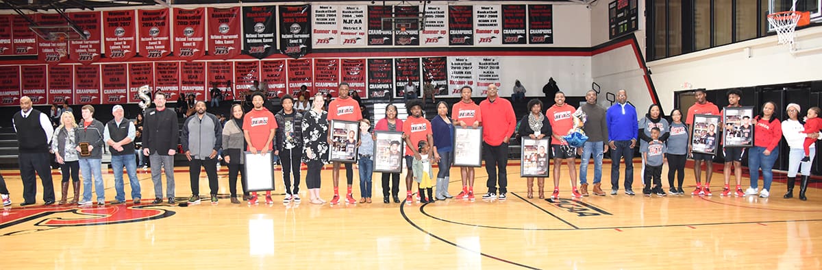 Shown above are the sophomore Jets and their framed posters that were presented to them as part of the Sophomore Day recognition.