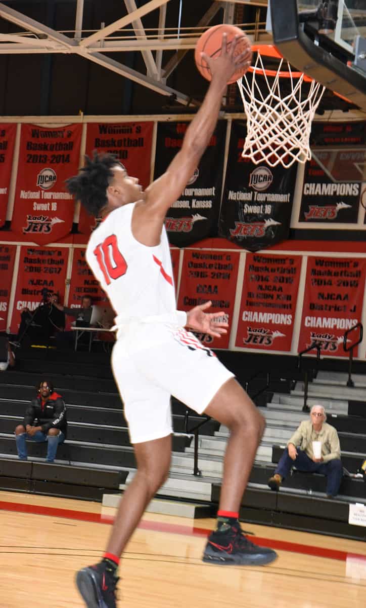 Marvin McGhee (10) led his team to victory over the Albany Tech Titans with 25 points and 10 rebounds.