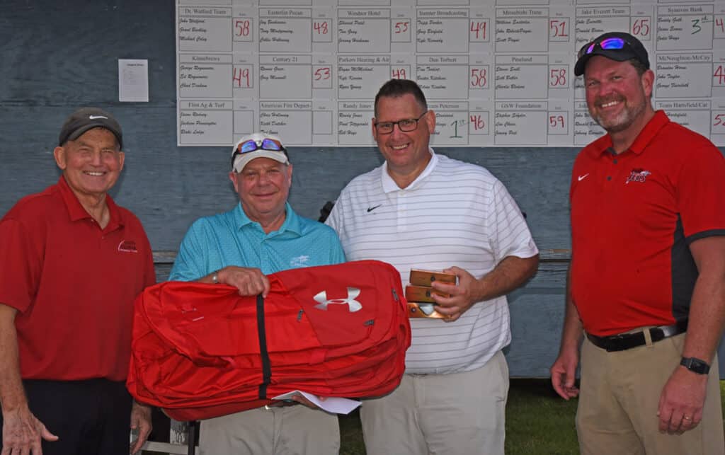 Shown above are SGTC President Emeritus Sparky Reeves congratulating Buddy Guth on the Synovus team’s third place finished.  Also shown are SGTC Athletic Director James Frey and SGTC President Dr. John WatfordDr. John Watford with SGTC President Emeritus Sparky Reeves welcoming everyone to the sixth annual Jets Booster Club Sparky Reeves Classic Golf Tournament.