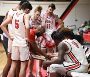 Jaren Harris is shown above working with the Jets during a timeout.