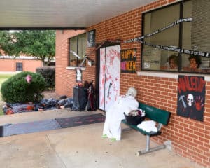 The cosmetology program's winning entry in the Halloween door decorating contest