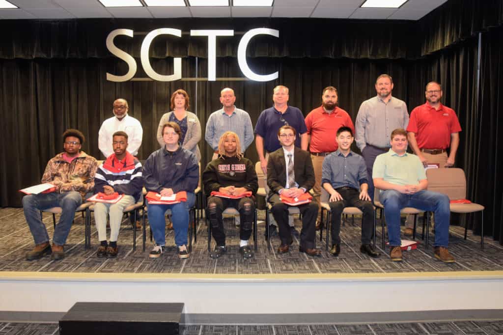 Pictured are nominees for SGTC Student of excellence and their instructors. Seated (l-r) are Keith Bell, Eric Bailey, Desirae Cooper, Gabrielle Wade, Jacob Jones, Joseph Jolly, and Jarod Anderson. Standing (l-r) are instructors Johnny Griffin, Kristie Hudson, Patrick Owen, Mike Collins, Brandon Gross, Chad Brown, and Ted Eschmann. Not pictured is nominee Levi Moore.