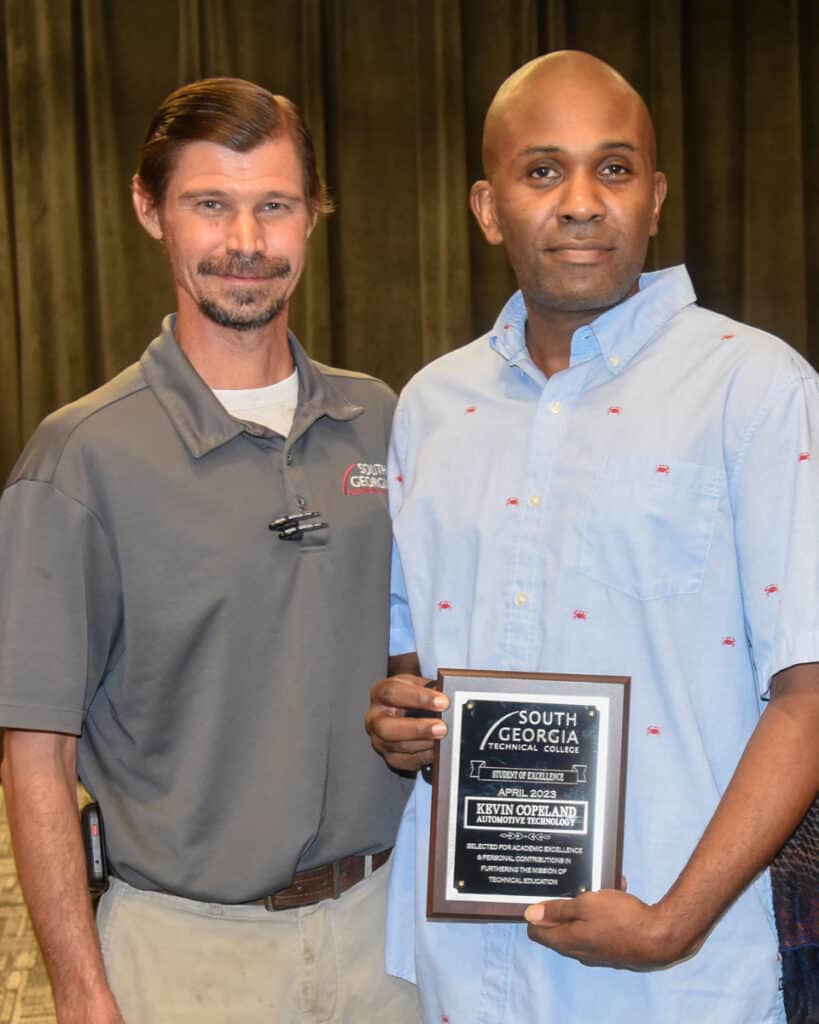 SGTC Student of Excellence Kevin Copeland (right) with Automotive Technology instructor Brandon Dean.