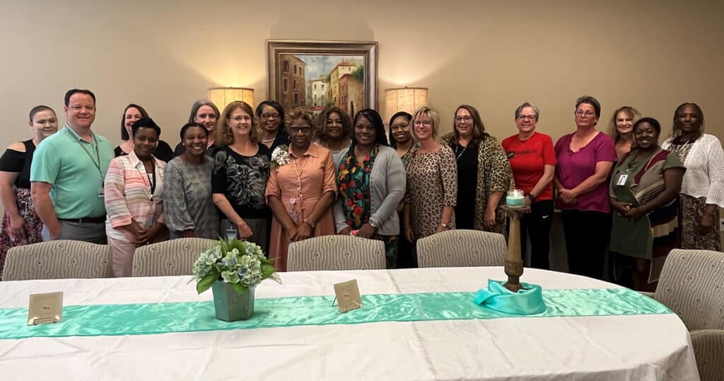 Shown above are Gloria Bell with some of the individuals who stopped by to wish her well during the retirement reception.