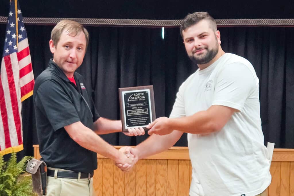 Pictured are SGTC Student of Excellence winner James Williams (right) with Electrical Systems Technology instructor Jeff Sheppard.