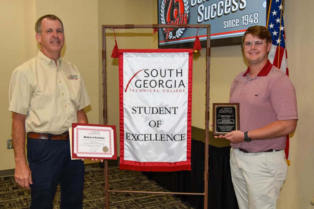 SGTC Student of Excellence winner Blake Oliver (right) with Aviation Maintenance Technology instructor Paul Pearson.