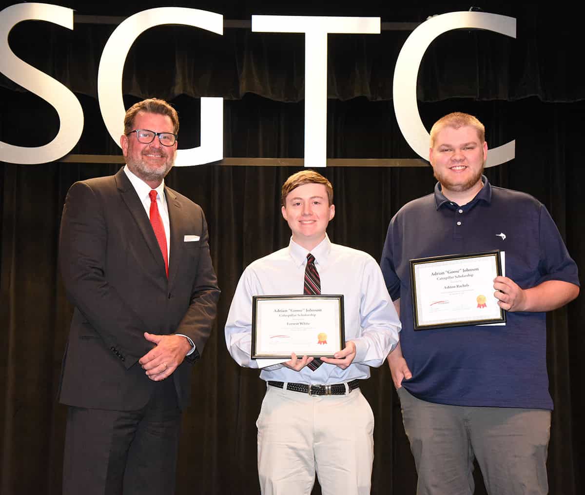 Shown above with SGTC President Dr. John Watford (l to r) are Thompson Tractor students and Adrian “Goose” Johnson Tool Scholarship recipients Forrest Weldon White of Rockford, AL; and Ashton Lane Rachels of Odenville, AL.