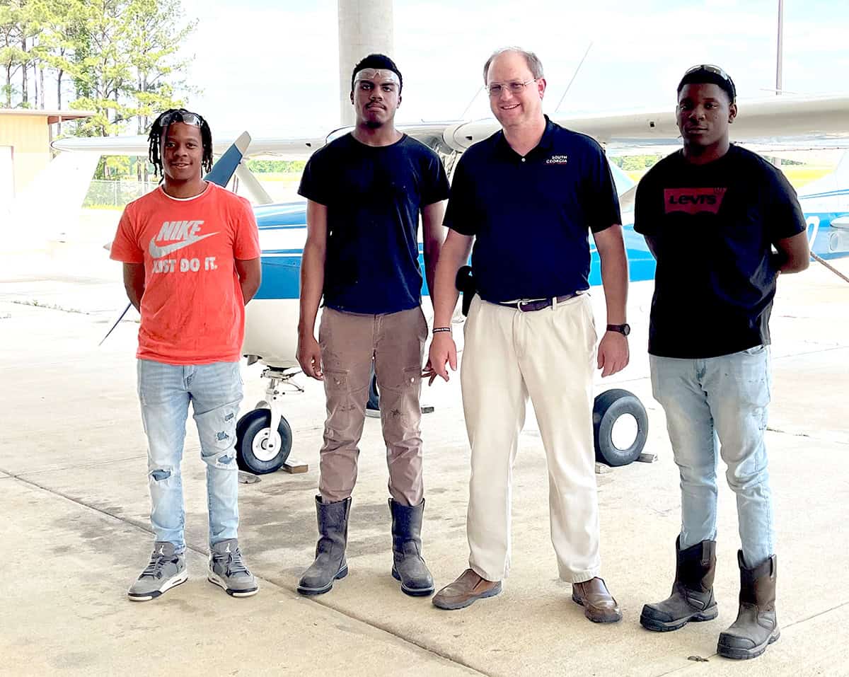 SGTC Aircraft Structural Instructor Jason Wisham is shown above (third from left) with Desmond Williams of Monetzuma, a rising third semester student who has hopes of going to Thrush Aircraft after graduation; Cameran Hillsman and Darius Carter, who completed the SGTC program and are beginning new jobs at the Warner Robins Air Force base.