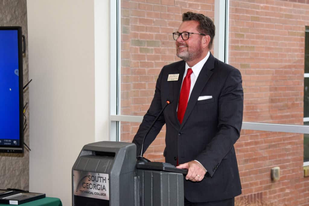 Dr. John Watford at podium