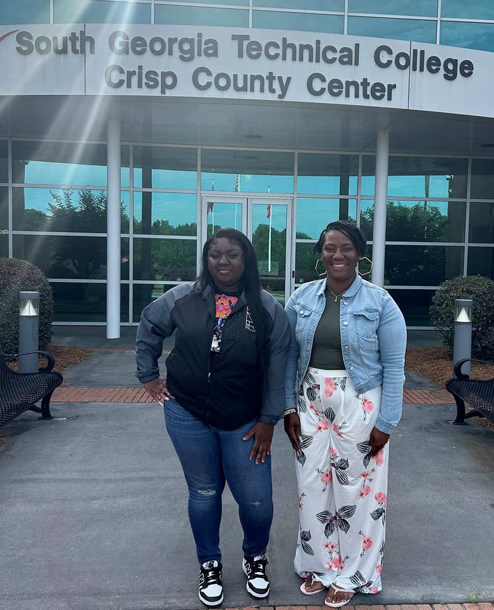 Tiwanna Williams (right) is shown above with her daughter, Riene Thompson (left). Both are attending classes at South Georgia Technical College’s Crisp County Center this summer. Williams is completing her associate degree in Early Childhood Care and Education with Mrs. Lisa Penton, and Riene Thompson is beginning her journey in the Medical Assisting program with Mrs. Carol Cowan.