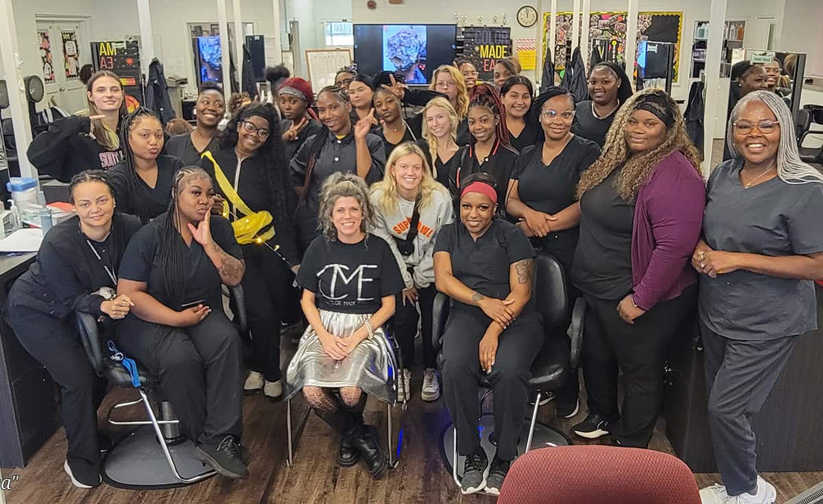 South Georgia Technical College Cosmetology Instructor Dorothea Lusane McKenzie (right) is shown with her students and Jennifer Bowens after the “Color Made Easy” presentation.