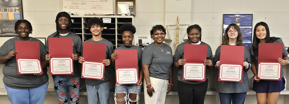 SGTC’s Tammy Hamilton (center) is shown above with the Taylor County High School students who completed the SGTC Direct Customer Training session.