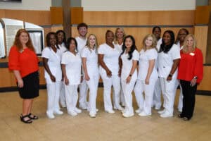 Pictured are recent graduates of the SGTC Practical Nursing program and their instructors at the recent pinning ceremony. Shown left to right are Jennifer Childs, Elizabeth Munene, Keisha Swanson, Veronica Mura, John Mizell, Amanda Pickle, Kiauna Duncan, Lauren Hughes, Merari Alexandra Aparicio, Hailey Dunford, Shawanda Brown, Jareca French, Ashley Walker and Christine Rundle.