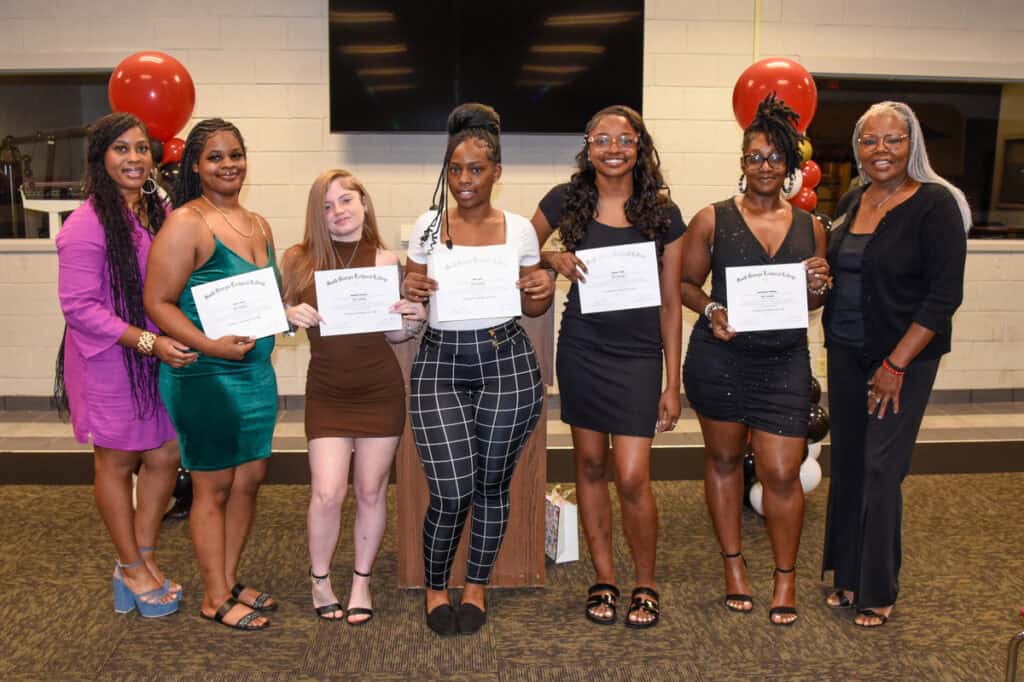 SGTC Nail Tech instructor Jessakeetha Maddox (left) and Cosmetology instructor Dorothea Lusane-McKenzie (right) are pictured here with recent graduates of the SGTC Nail Tech program.