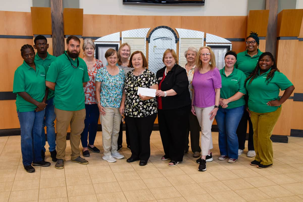 Pictured (l to r) for the donation presentation are SGTC Environmental Horticulture students Lisa Sellers, Cory Shelly, SGTC Instructor Brandon Gross, Club members Janice Webb, Sharon McFarland, Judy Parkinson, Maxine Stribling, SGTC’s Su Ann Bird, Club members Myrt Radney, Pam Dowdy, and SGTC Horticulture students Cass Williams, Zaria Green, and Keinosia Brown.