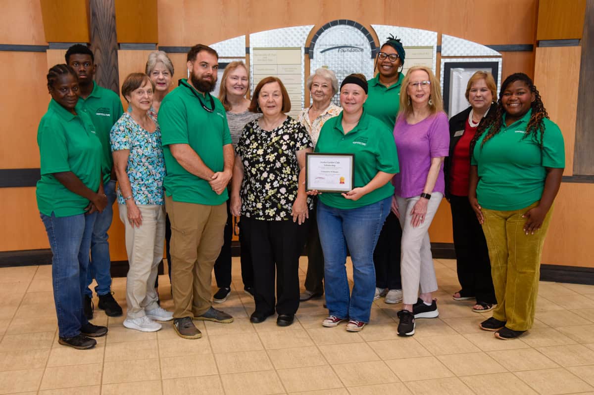 Pictured (l to r) are: SGTC Environmental Horticulture Instructor Brandon Gross (fifth from left) is shown above with Azalea Garden Club Past President Maxine Stribling who presented the Azalea Garden Club scholarship to SGTC Environmental Horticulture student Cassandra Williams. Mary-Katherine Madrid was not present. Also shown are SGTC Horticulture students Lisa Sellers, Cory Shelley, Zaria Green, Keinosia Brown, and Garden Club members Janie Webb, Sharon McFarland, Judy Parkinson, Myrt Radney and Pam Dowdy along with SGTC Foundation Executive Director and Vice President of Institutional Advancement Su Ann Bird.