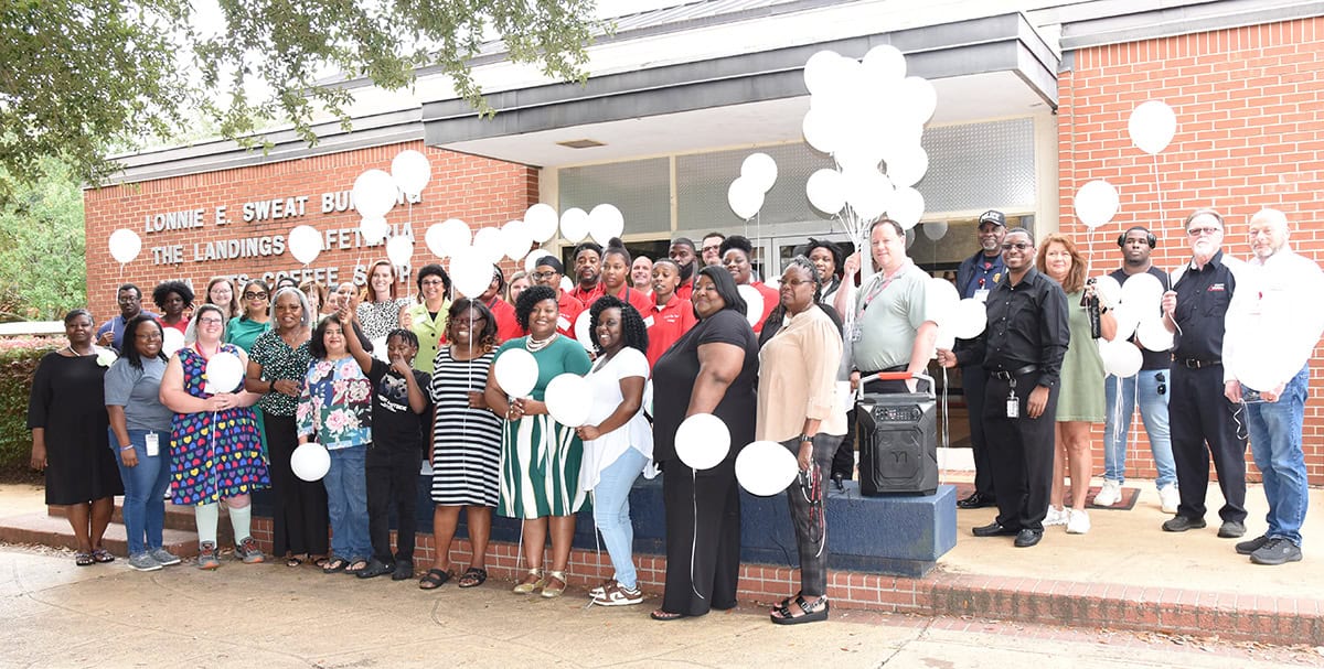 SGTC faculty, staff, students, and ARAMARK employees gather for the memorial Balloon release in honor of Shirley Trice.