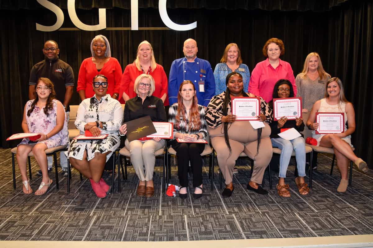 Nominees for SGTC’s Student of Excellence Award for October were (front row, L-R) Fabiola San Martin Garcia, Chinequia Johnson, Barbara Chestnut, Tera Parker, Kanijah Foster, Keyona Bell, and Kimberly Nipper. Back row (l-r) are nominating instructors Andre Robinson, Dorothea Lusane-McKenzie, Teresa McCook, Ricky Watzlowick, Jaye Cripe, Jeana Yawn, and Christine Rundle.