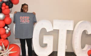 Tyechia Tullis is shown above with an SGTC “Bridging the Gap” t-shirt after registering for the core classes for the LPN to RN Bridge program for C-term which begins October 16.